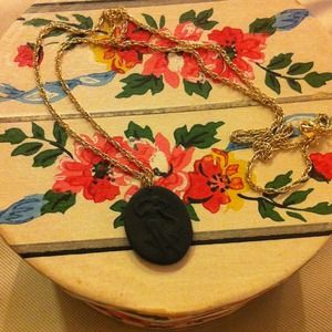 Black Plastic Cameo Pendant in Gold Tone Chain