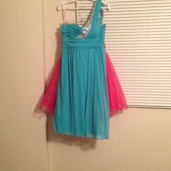 Blue, one shoulder knee length gown.