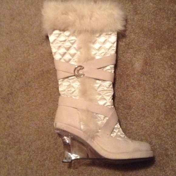 Off white satin and leather boots.