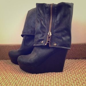 Black wedge boots.