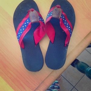 Eliza B. flip flops