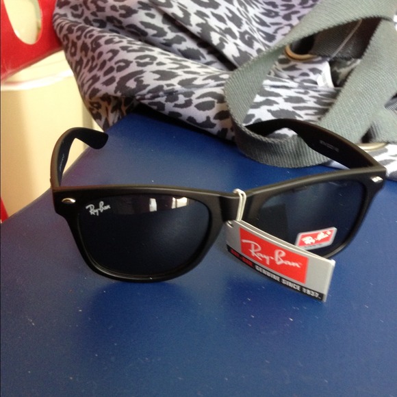 Flat black Ray Ban sun glasses brand new