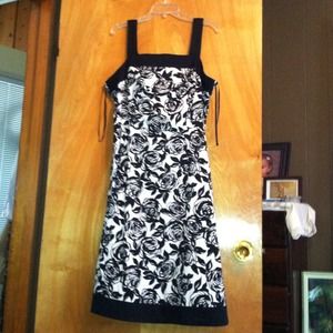 Gorgeous dress with rose pattern throughout.