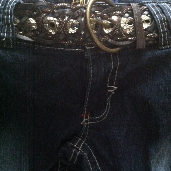 Flared jeans with sparkly belt