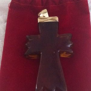 Amber Cross set in 14kt Gold.