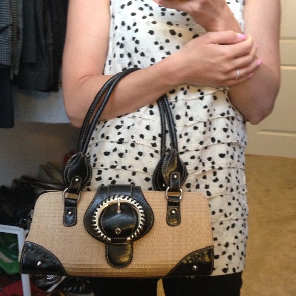 Sold.....Tan bag with black trim