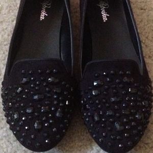 **sold** black jeweled flats.