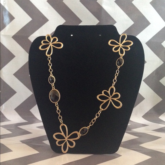 Gold flower with black stone necklace