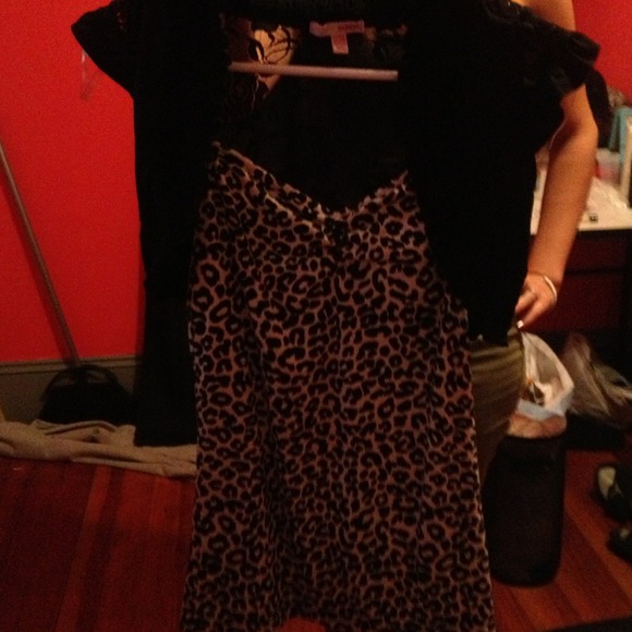 Cheetah print shirt with little black throw over