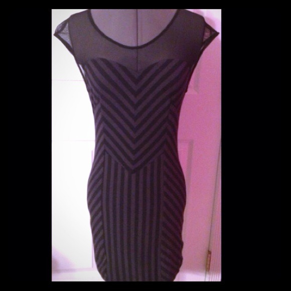 Only worn once, form-fitting striped dress.