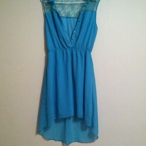 A mermaid tail teal dress lace back shoulder