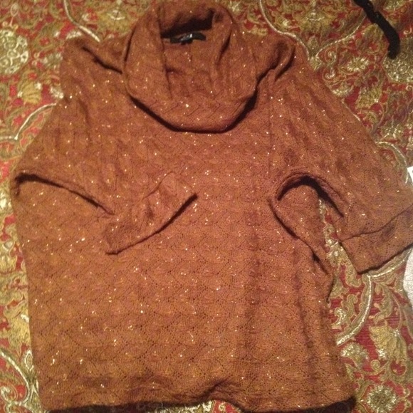 Nice brown shirt. Worn a few times