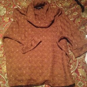 Nice brown shirt. Worn a few times