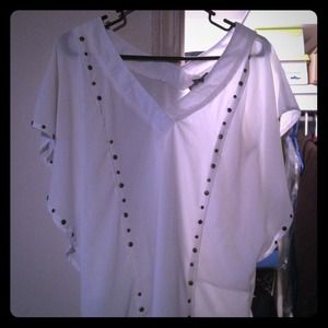 A form fitting slightly see through shirt.