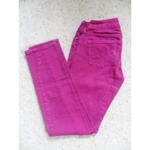 Fuschia colored skinny jeans