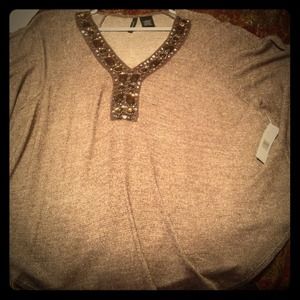 Nice shinny Brown shirt.