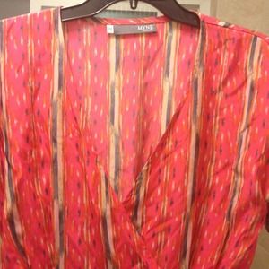 Myne orange dress with pockets.