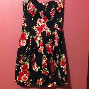 A black with flower designed dress