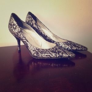 Lightly worn lace Chanel pumps