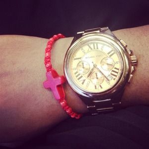 Micheal Kors Rose gold watch .