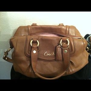 Authentic coach satchel purse with tags.