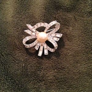 Beautiful Bow Brooch with pearl in center Sold
