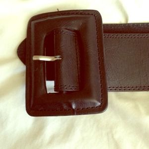 Wide belt with large front buckle