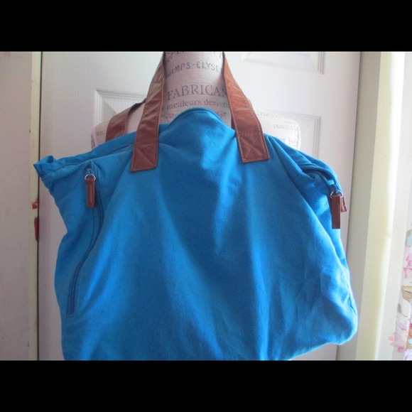 A blue Avon bag