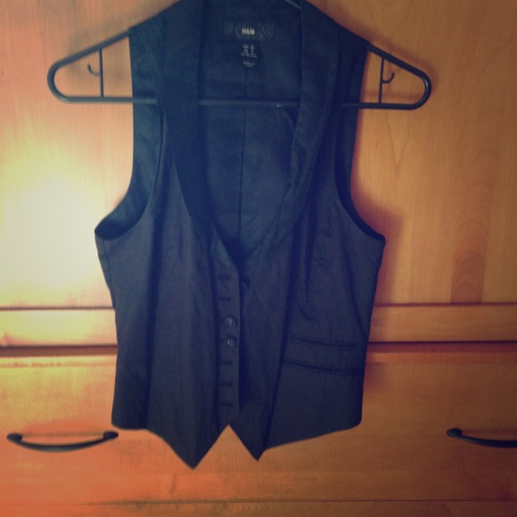 Black button-up vest