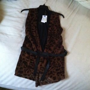 Cheetah print shirt.