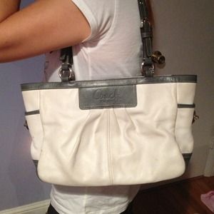 White coach bag with a matching coach wallet