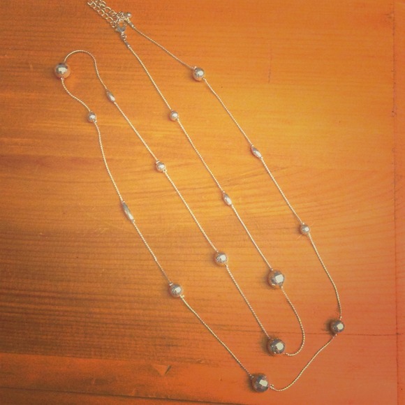 Long silver beaded necklace