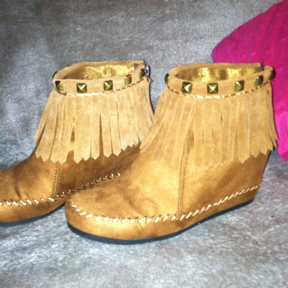Tan fringed booties