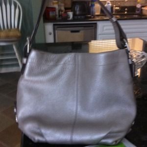 Coach handbag in blush-colored leather