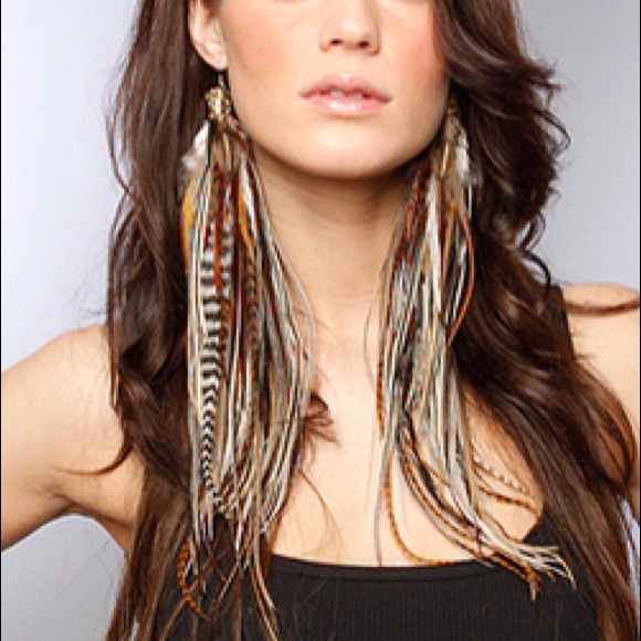 Brand new never worn Owlita feather earrings