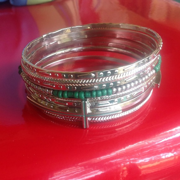 New Silver toned bangle set with cross and beads