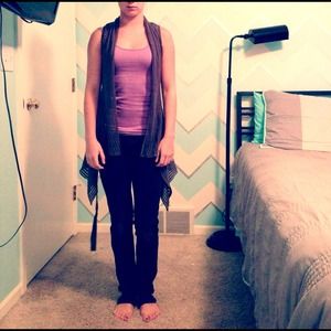 Long gray sleeveless sweater