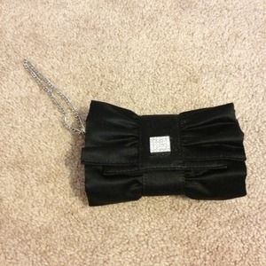 Brand new Black clutch.