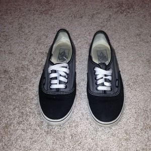 Black and gray Vans