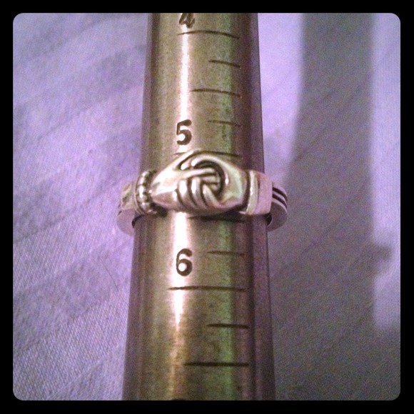 Two hands and heart sterling silver ring.