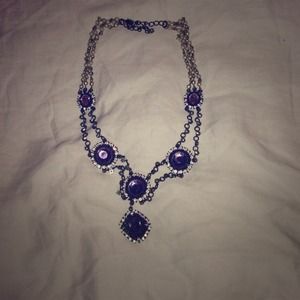 Beautiful purple stone necklace with pearls.