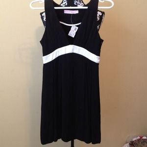 Black and cream colored dress. Size 0