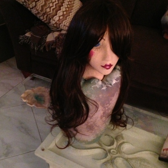 Med:Dark brown, long layers with long bangs