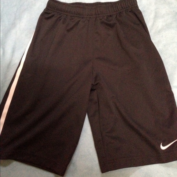 Nike black shorts with white stripe detail.