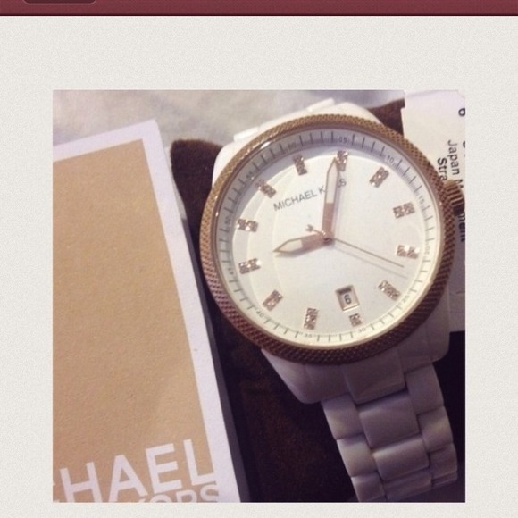 Authentic Michael kors watch white ceramic .