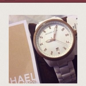Authentic Michael kors watch white ceramic .