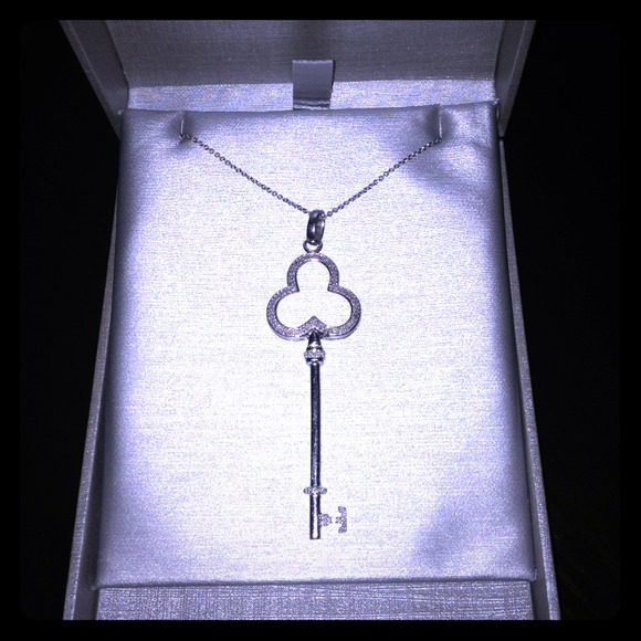 Silver and crushed diamond key necklace