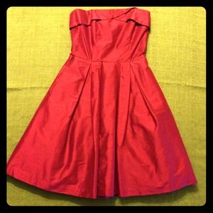 Cranberry strapless cocktail dress with pockets