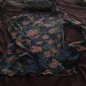 Two floral long sleeve shirts.