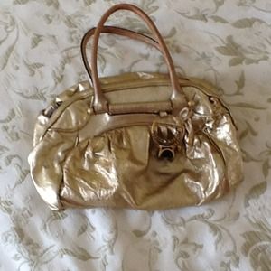Juicy couture golden bag.